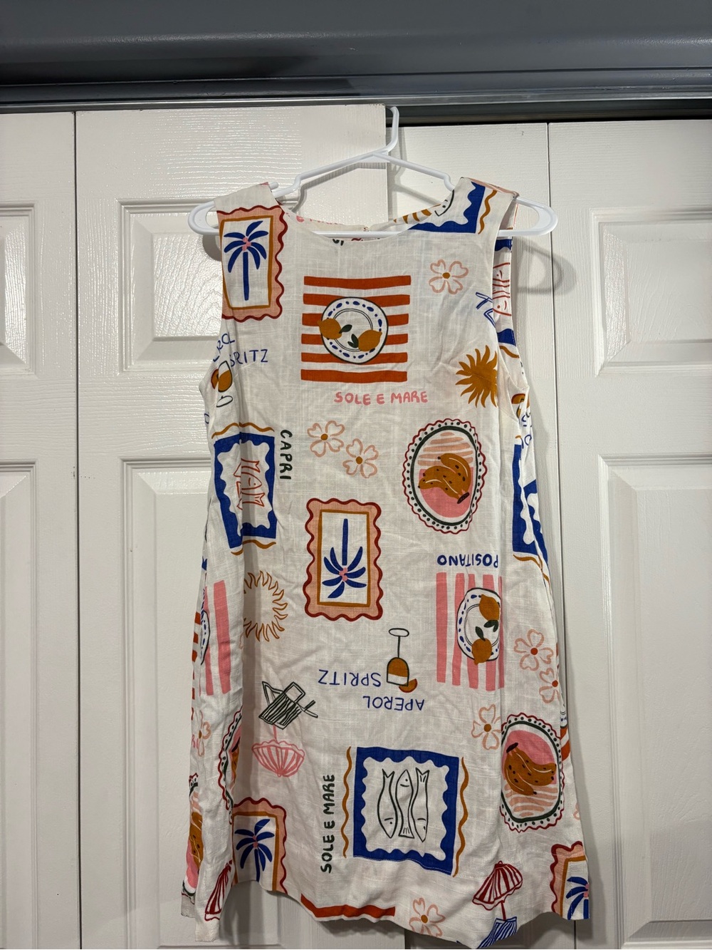 Sleeveless Printed A-Line Dress in Cream with Multicolor Motif AND POCKETS!